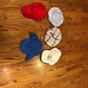 Five Toddler Hats: one sun, three jack and Janie and one polo
